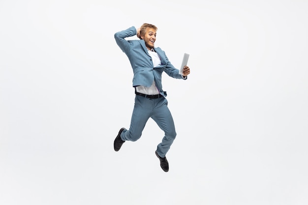 Free photo office man running, jogging on white