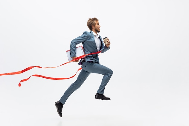 Free photo office man running, jogging on white