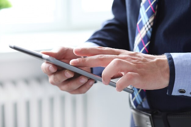 Office. Man with tablet