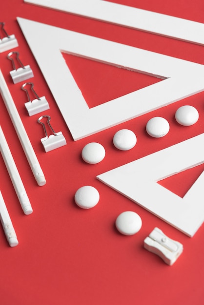 Office supplies on red table