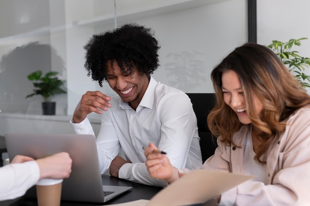 Free photo office workers working together as a team