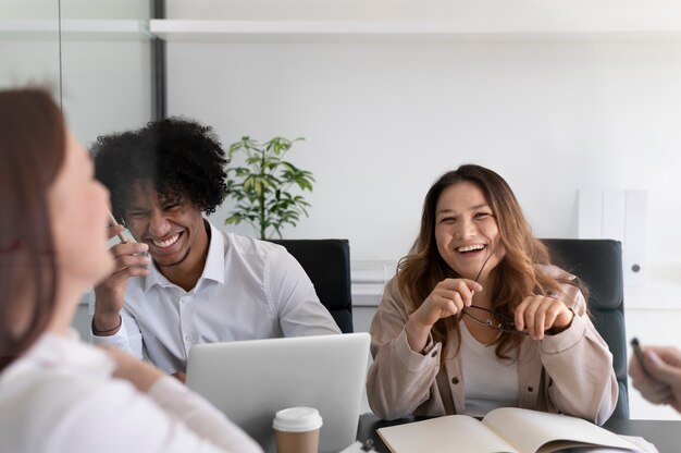 Office workers working together as a team