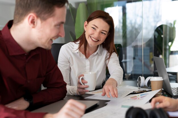 Office workers working together as a team