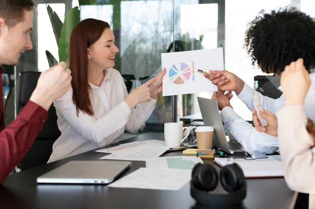 Office workers working together as a team