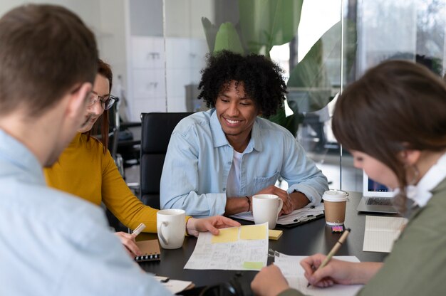 Office workers working together as a team