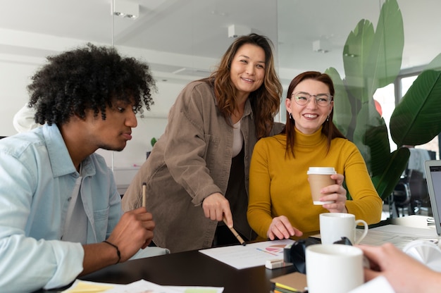 Office workers working together as a team