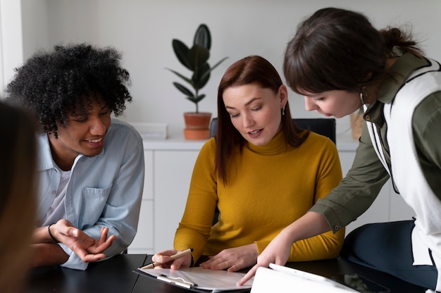 Office workers working together as a team