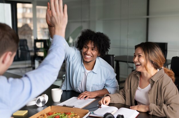 Office workers working together as a team