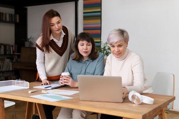 Office workers working together as a team