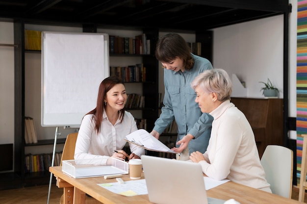 Office workers working together as a team