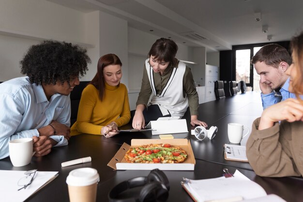 Office workers working together as a team