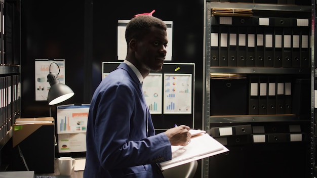 Officer reviewing criminal records