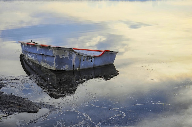 Free Photo old abandoned boat on the lake