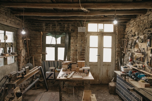 Free Photo old atelier and tools of a carpenter