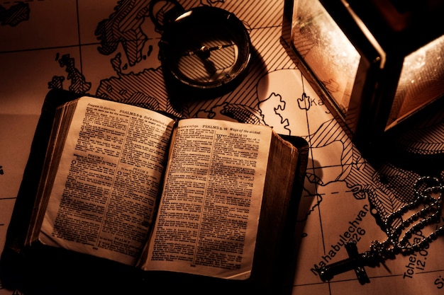 An old bible on a wooden table