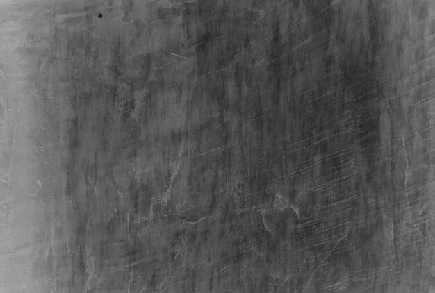 Old black background. Grunge texture. Dark wallpaper. Blackboard Chalkboard Concrete