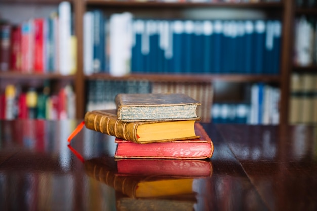 Free Photo old books on library table