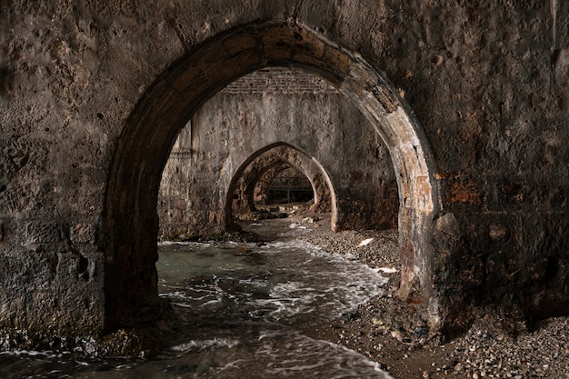 Free Photo old city aquatic tunnels on coast line alanya