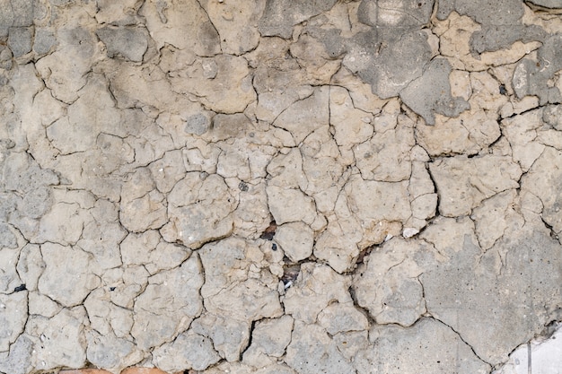 Old cracked concrete wall texture background