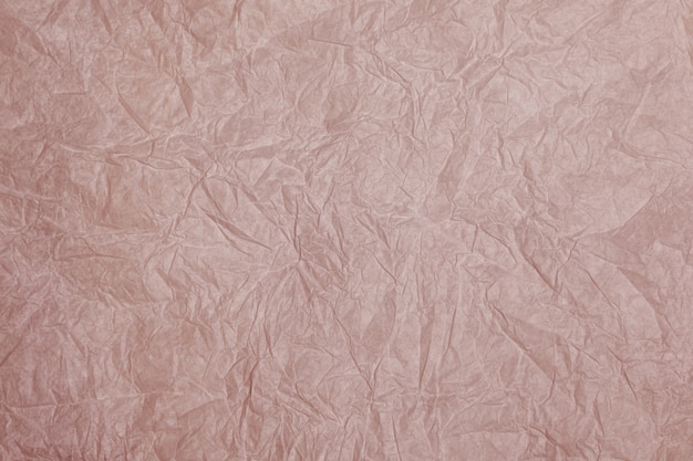 Old crumpled grey paper background texture. Old crumpled pastel pink paper background texture