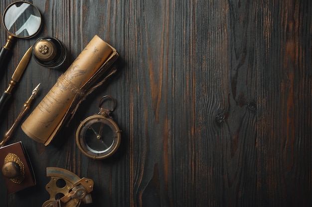 Old fashioned flat lay with letters writing accessories on dark wooden table