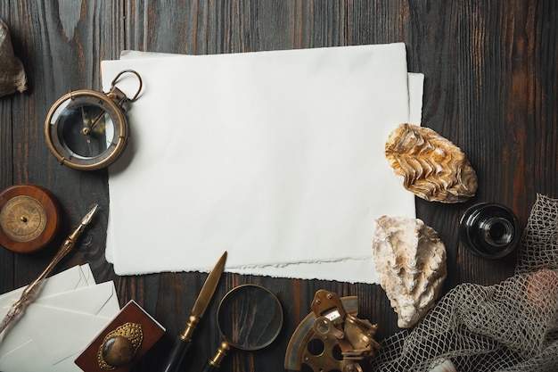 Old fashioned flat lay with letters writing accessories on dark wooden table