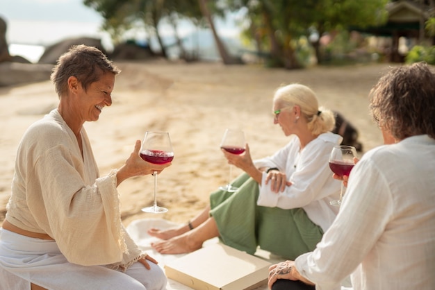 Old people having fun at the beach