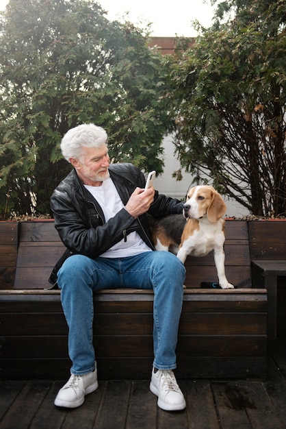 Old person with their pet dog