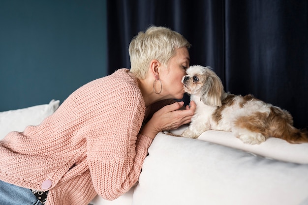 Old person with their pet dog