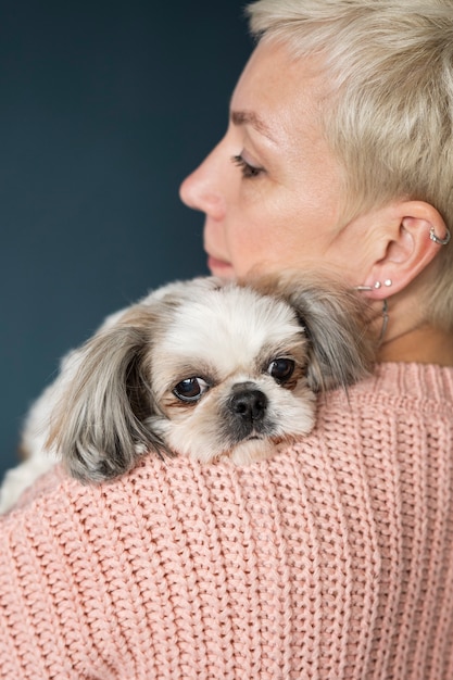 Free Photo old person with their pet dog