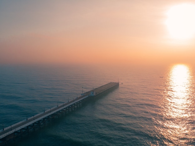 Free Photo old port pier in pondicherry rock beach during the sunset