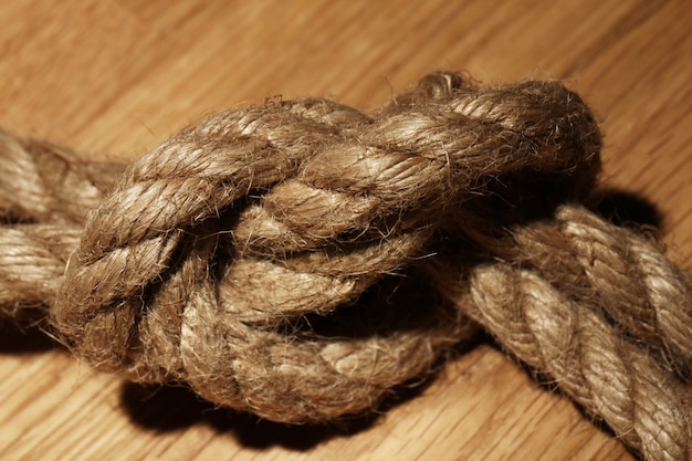 Free Photo old rope over wooden surface