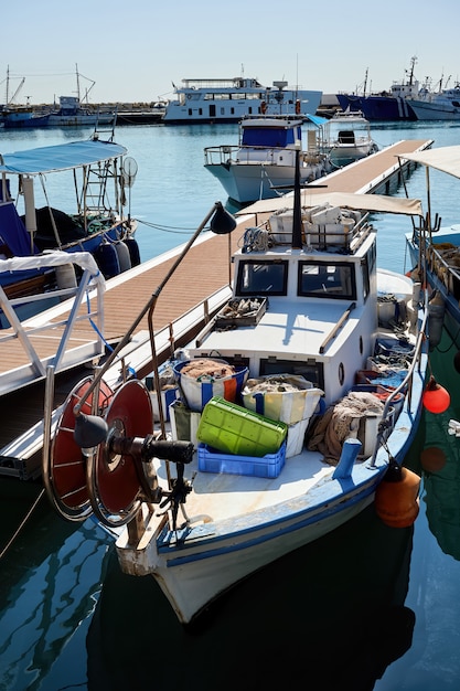 Free photo old rusty fisher boat in a port