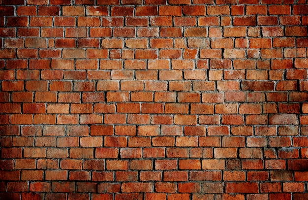 Free photo old textured brick wall background