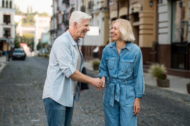 Older couple outdoors in the city together