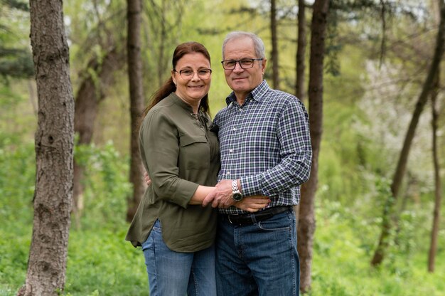 Older couple posing in the park