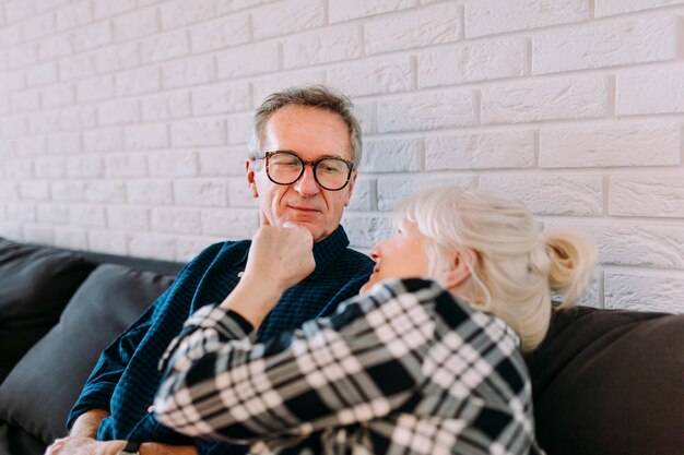 Older couple sitting in retirement home