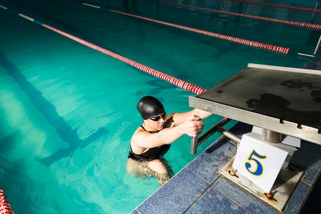 Free photo olympic swimmer preparing to race