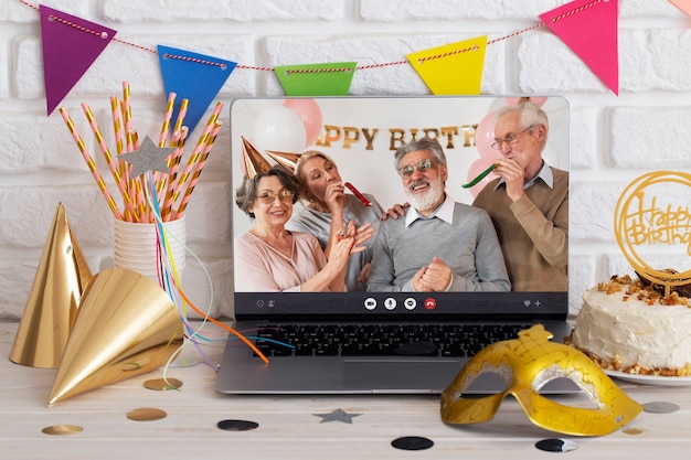 Free photo online party celebration with laptop and decorations