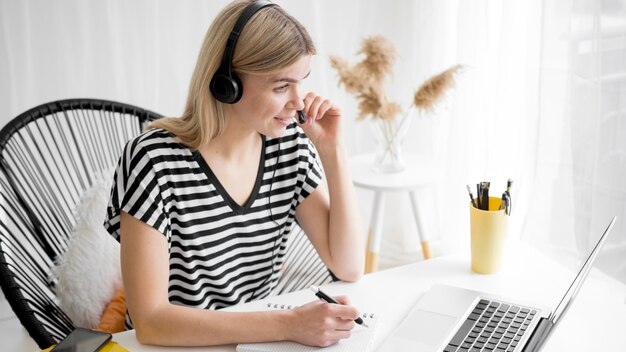 Online remote courses high view student at her desk