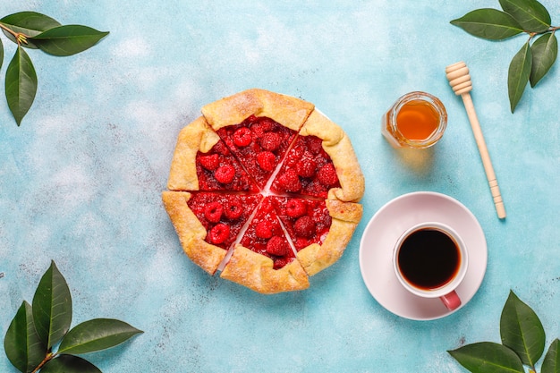 Open pie, raspberry galette. Summer berry dessert.