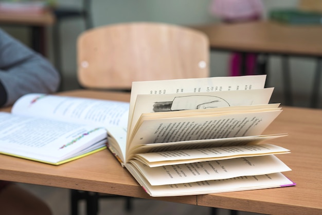 Free photo opened book on table