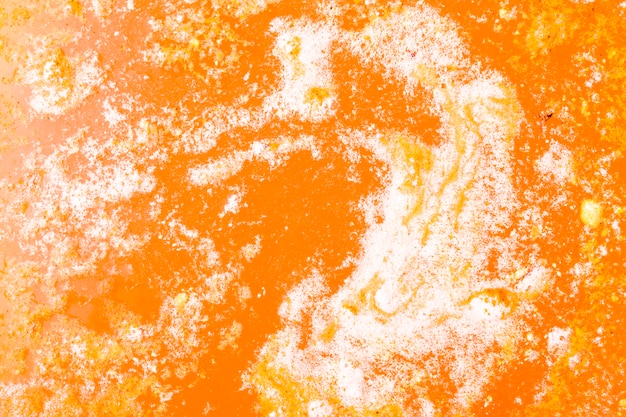 Free photo an orange bath bomb foam textured backdrop