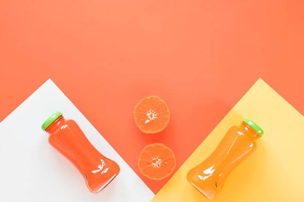 Orange and grapefruit smoothie on table