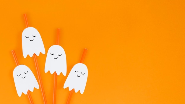 Free Photo orange halloween ghost straws set design resources