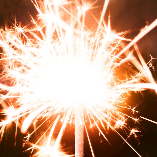 Free photo orange new year festive sparkler