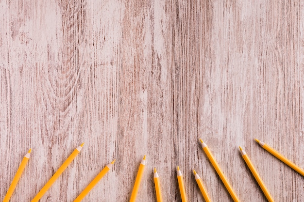 Orange pencils on desk