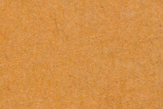 Free photo orange recycled paper texture