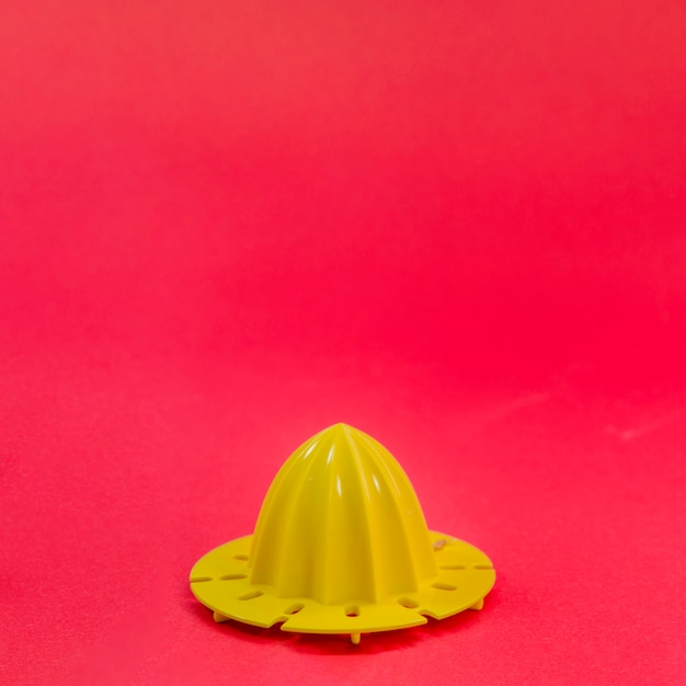 Orange squeezer with color background