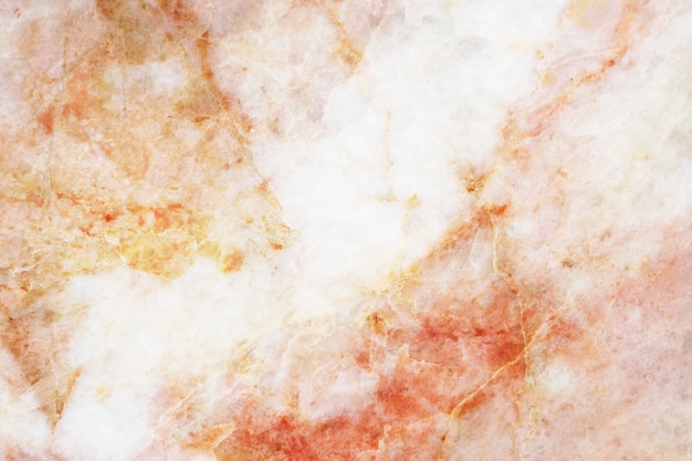 Free photo orange and white marble textured background